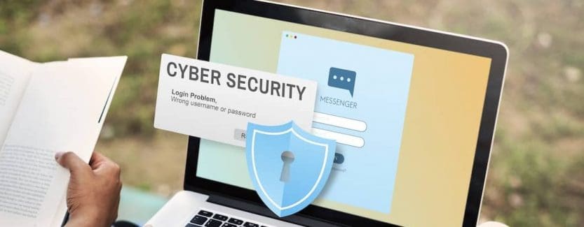 cybersecurity warning on a laptop at login