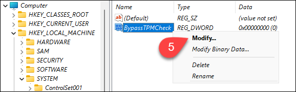 Modifying the BypassTPMCheck value in Windows 11 installer.
