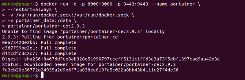 Using the docker run command to pull the Portainer CE image from the Docker Hub and start a container.