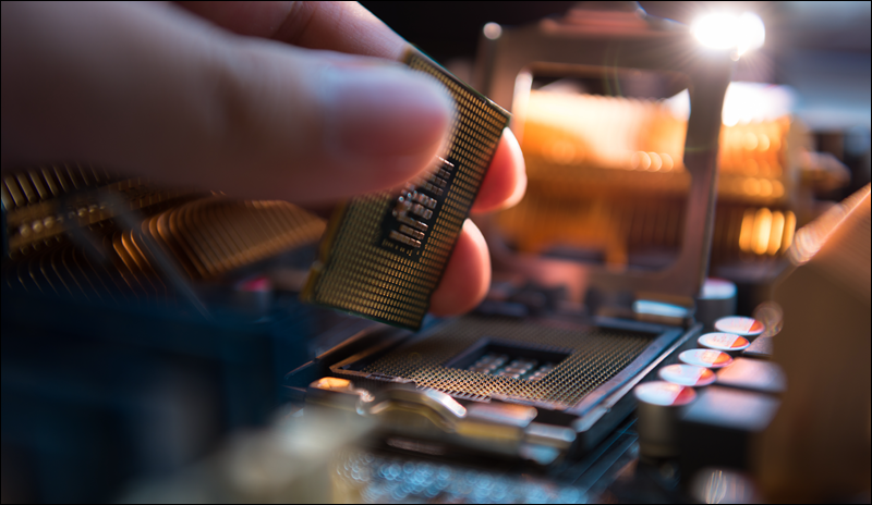 An image of a CPU being placed on the motherboard.