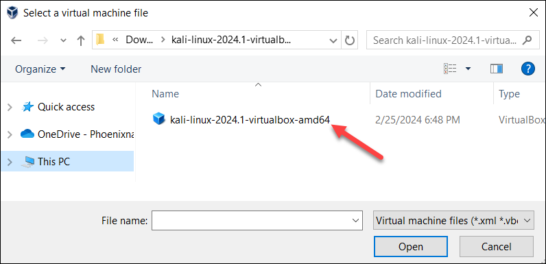 Locating the downloaded and unpacked virtual machine file.