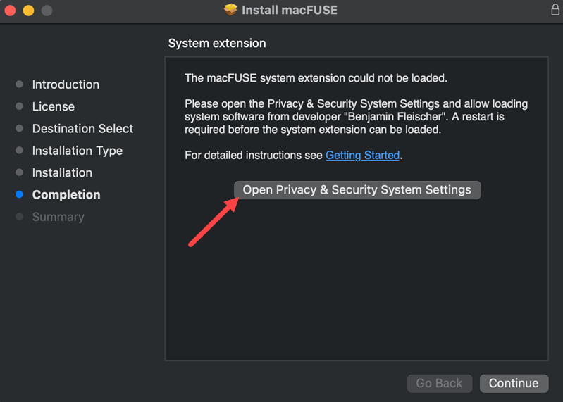 The prompt asking to allow loading system software in the Privacy & Security section of System Settings.