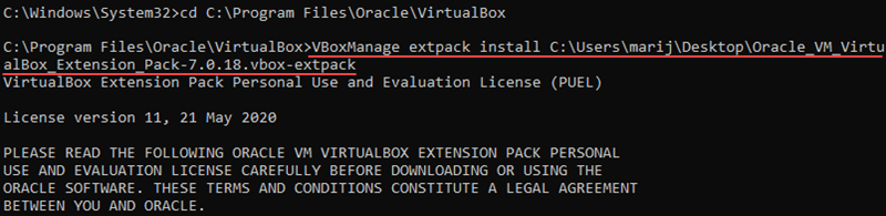 Installing the VirtualBox extension pack using the VBoxManage tool in Windows.